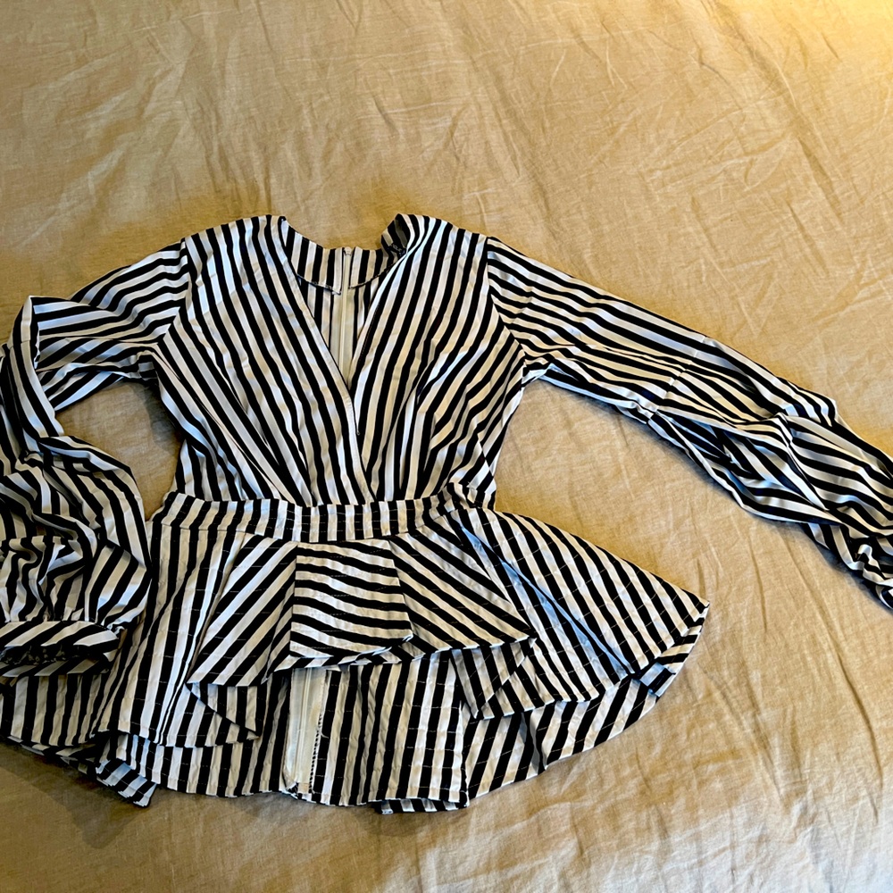 Gorgeous peplum striped faux wrap long sleeve top